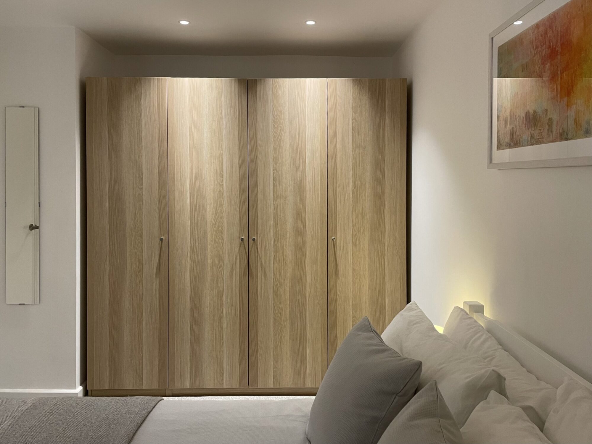 "North Berwick and Edinburgh Architecture for softly lit, newly refurbished guest bedroom and wardrobe"